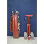 A VINTAGE GOLF BAG containing 10 Ben Hogan irons and two putters along with an Ace trolley