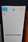 A BEKO CFG1552W FRIDGE FREEZER width 55cm, depth 56cm, height 152cm (PAT pass and working at 5