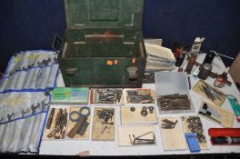 A MILITARY TIN OF ENGINEERING TOOLS to include tap and die sets, screw extractors, drill bits,