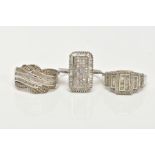 THREE WHITE METAL DIAMOND SET DRESS RINGS, large dress rings, each set with single cut and tapered