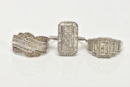 THREE WHITE METAL DIAMOND SET DRESS RINGS, large dress rings, each set with single cut and tapered