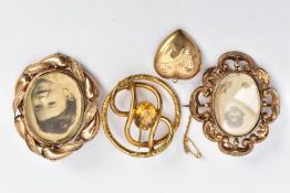 THREE BROOCHES AND A LOCKET PENDANT, to include an oval yellow metal double photograph swivel brooch