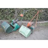 THREE VINTAGE PETROL LAWN MOWERS, to include a Qualcast Suffolk Punch 43s with grass box (engine