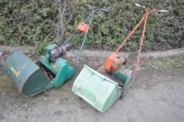 THREE VINTAGE PETROL LAWN MOWERS, to include a Qualcast Suffolk Punch 43s with grass box (engine