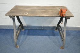 A VINTAGE BESPOKE TRESTLE WORK BENCH, with a slatted pine top, on a cast iron base, attached with