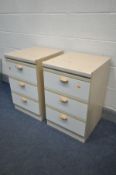 A PAIR OF THREE DRAWER BEDSIDE CABINETS