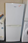 A CANDY CSC1365WE FRIDGE FREEZER width 54cm, depth 56cm and height 135cm (PAT pass and working at