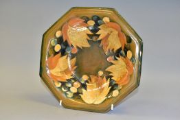 A MOORCROFT LEAVES AND BERRIES OCTAGONAL SALT GLAZE BOWL, stamped to underside of base, 25.5cm