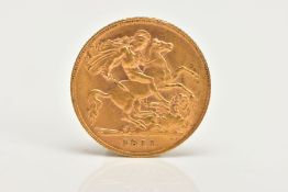 A GOLD HALF SOVEREIGN COIN, George V dated 1911