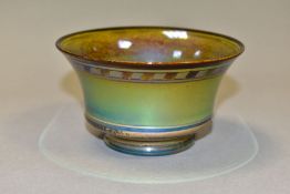 A PILKINGTONS ROYAL LANCASTRIAN GREEN LUSTRE FOOTED BOWL, foliate design to the interior and