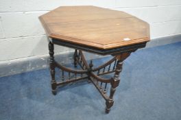 A LATE VICTORIAN OCTAGONAL CENTRE TABLE, on turned supports, united by stretchers with graduating