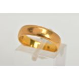 A 22CT GOLD BAND RING, a courted band, approximate width 5mm, hallmarked 22ct Birmingham 1945,