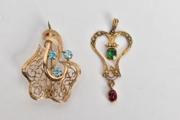 A 9CT GOLD BROOCH AND A YELLOW METAL PENDANT, the brooch of an openwork design set with three