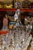 A WHITEFRIARS CRYSTAL DECANTER AND SHERRY GLASSES, comprising a mallet shaped decanter and