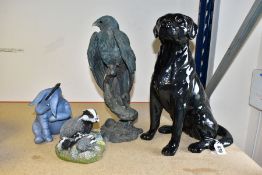 A BESWICK FIRESIDE SERIES FIGURE OF A SEATED BLACK LABRADOR, model 2314, height 34cm, together