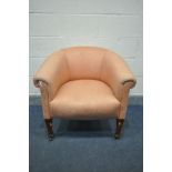 AN EARLY 20TH CENTURY MAHOGANY TUB CHAIR, with pink upholstery, ceramic casters, width 77cm x