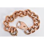 A ROSE METAL CHAIN BRACELET, a hollow rose tone curb link chain, some links detailed with a scale