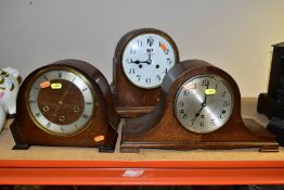 THREE FIRST HALF 20TH CENTURY OAK CASED DOME TOPPED MANTEL CLOCKS, comprising a Smiths three train