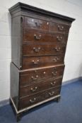 A GEORGIAN MAHOGANY CHEST ON CHEST, of two short and six long drawers, with a central brushing