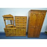 A QUANTITY OF MODERN PINE FURNITURE, to include a two door wardrobe, width 83cm x depth 50cm x