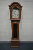 AN OAK LONGCASE CLOCK TRUNK, with a matched painted wooden 10 inch dial, eight day movement, with