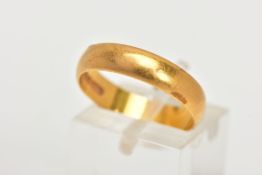 A 22CT GOLD BAND RING, a courted band, approximate width 4.5mm, hallmarked 22ct Birmingham 1987,