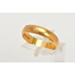 A 22CT GOLD BAND RING, a courted band, approximate width 4.5mm, hallmarked 22ct Birmingham 1987,