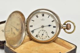 A SILVER CASED POCKET WATCH, a hand wound hunter pocket watch, white dial, roman numerals,