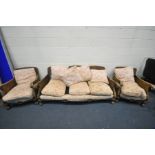 A MAHOGANY FRAMED BERGERE THREE PIECE SUITE, with loose cushions, comprising a three seater