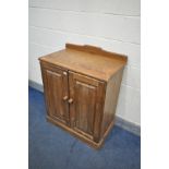 A PINE TWO DOOR CABINET, width 79cm x depth 47cm x height 95cm (condition:-multiple surface marks)