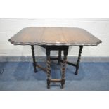 AN EARLY 20TH CENTURY OAK BARLEY TWIST GATE LEG TABLE, with pie crust edges, open length 103cm x