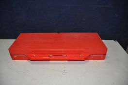 A VINTAGE PLASTIC FOLDING PICNIC TABLE with metal frame, red plastic seats and case