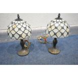 A PAIR OF TIFFANY STYLE TABLE LAMPS and a french style gilt wall mirror (3)