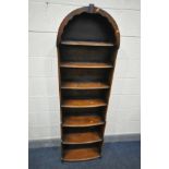 A REPRODUCTION OAK TALL WATERFALL BOOKCASE, with seven shelves, width 54cm x depth 25cm x height