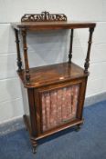 A LATE VICTORIAN WALNUT AND AMBOYNA CROSSBANDED MUSIC CABINET, the raised shelf with a raised open
