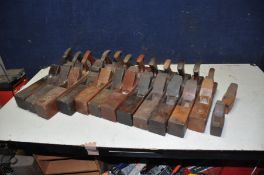 A COLLECTION OF FOURTEEN VINTAGE WOODEN PLANES including three at 22in, one at 19in, one at 17 3/4in
