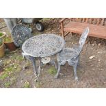 A GREY PAINTED CIRCULAR ALIMINIUM GARDEN TABLE, diameter 66cm with two matching chairs (