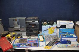 A COLLECTION OF HOUSEHOLD ELECTRICALS including a Toyota Model 4171 sewing machine with treadle,