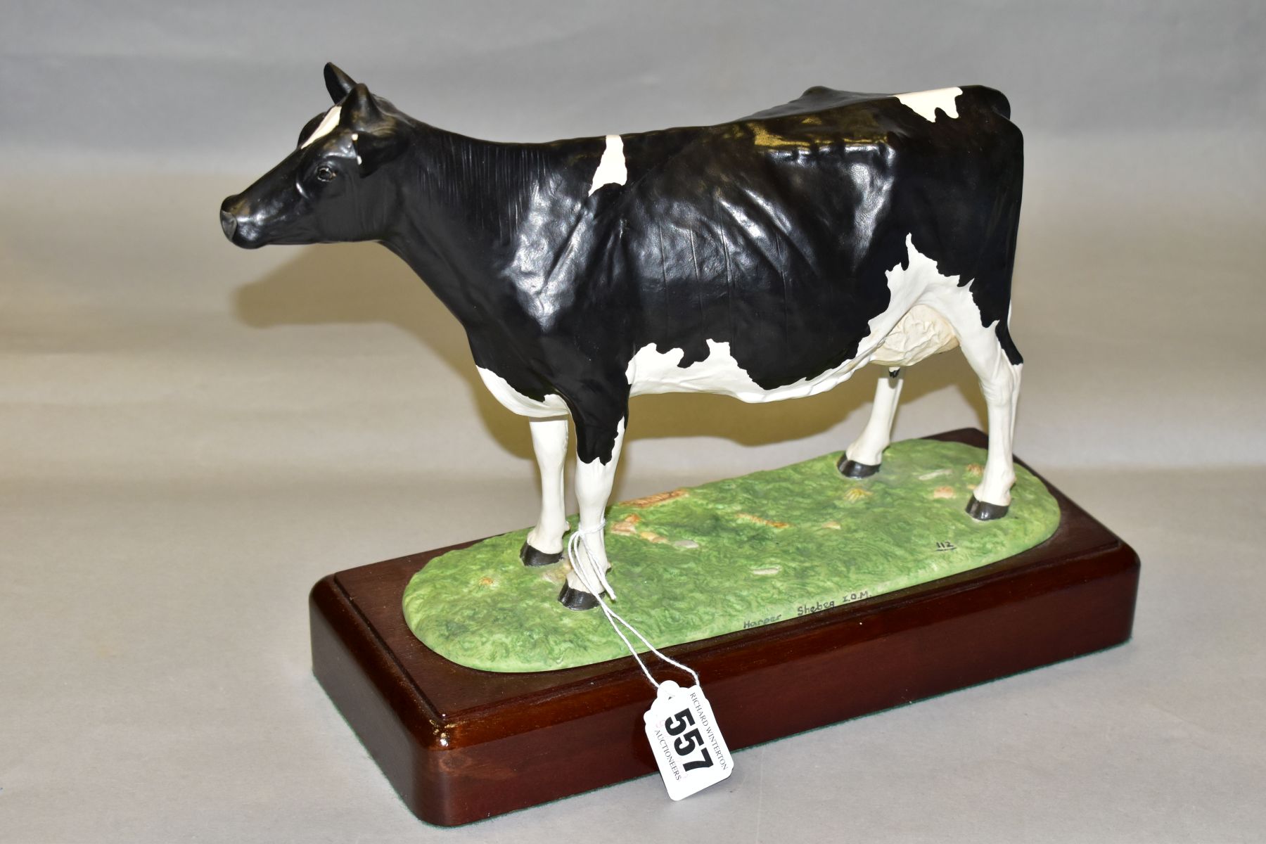 A SHEBEG ISLE OF MAN POTTERY FRESIAN COW, modelled by John Harpur, numbered 112, mounted to a wooden - Image 2 of 4