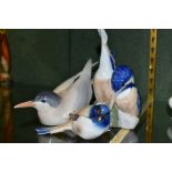 THREE ROYAL COPENHAGEN BIRD FIGURES, comprising a Pair of Kingfishers 1769 height 18cm, Tern