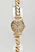 A LADIES 9CT GOLD 'OMEGA' WRISTWATCH, round gold dial signed 'Omega', baton markers, black hands,