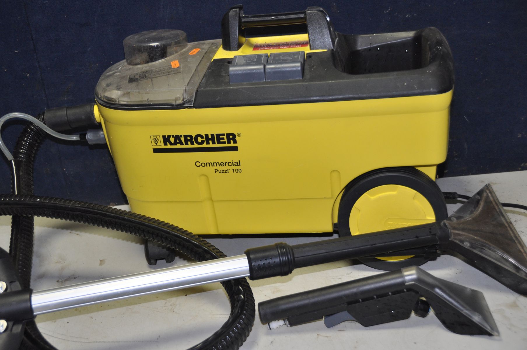 A KARCHER COMMERCIAL PUZZI 100 CARPET CLEANER with lance and two heads (PAT pass and working but - Image 2 of 3