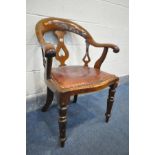 A LATE 19TH CENTURY MAHOGANY OFFICE ARMCHAIR with a red leather seat pad (condition:-rickety frame)