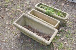 THREE COMPOSITE RECTANGULAR PLANTERS, the largest width 29cm x length 66cm