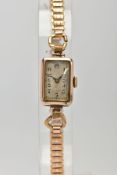 A LADIES 9CT GOLD WATCH, hand wound movement, rectangular discoloured dial, Arabic numerals, blue