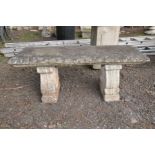A COMPOSITE RECTANGULAR GARDEN BENCH on separate scrolled supports, width 38cm x length 101cm x