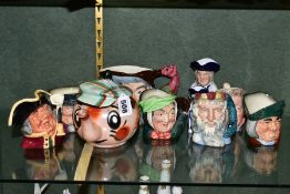 A GROUP OF CHARACTER AND TOBY JUGS, with a Wade Andy Capp the Golfer teapot (tiny areas of glaze