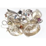 A BAG OF ASSORTED SILVER AND WHITE METAL JEWELLERY, to include a silver hinged bangle decorated with
