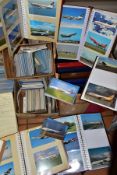 POSTCARDS, four boxes containing a collection of approximately three thousand postcards in