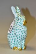 A HEREND GREEN FISHNET FIGURE OF A SEATED RABBIT, model no. 5327, pale blue ears, gilt nose, mouth